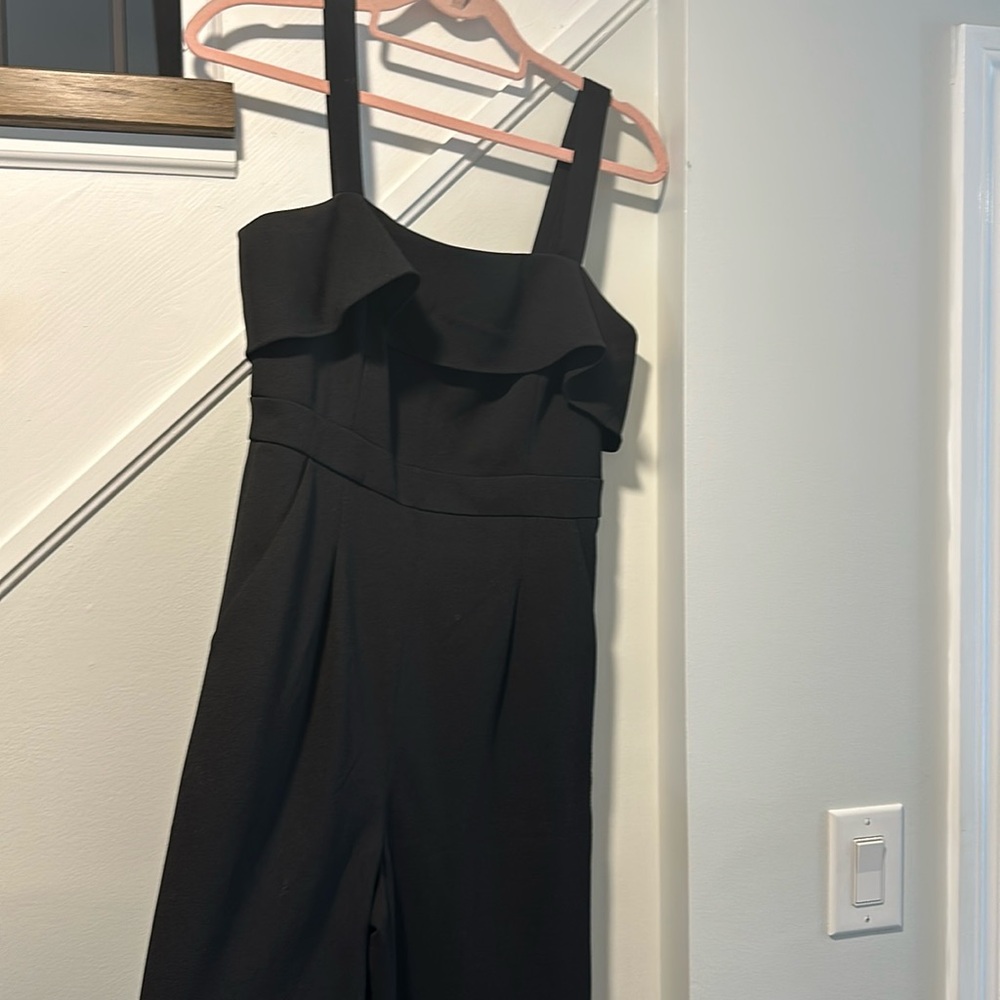 TAHARI black pant romper, with pockets! Zipper back. Size 8. In great condition!